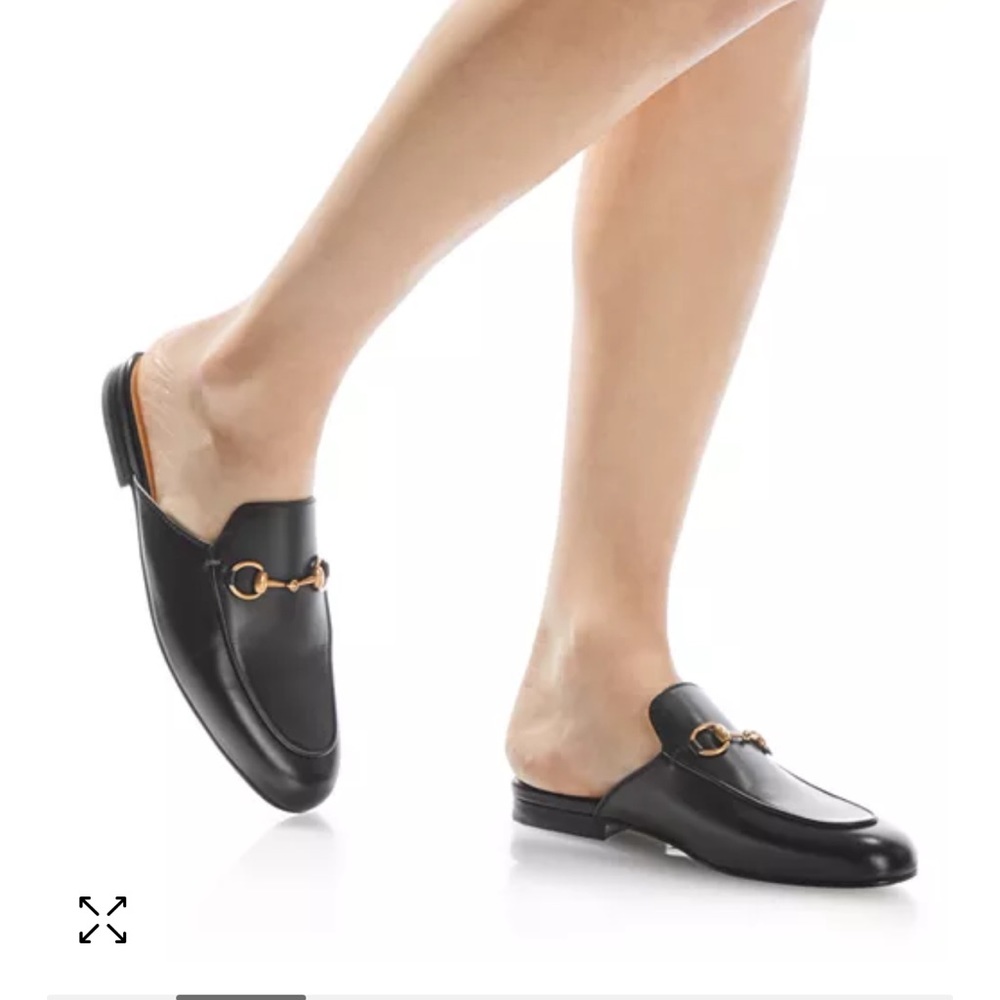 Black and gold Gucci Princetown mules. Great condition.